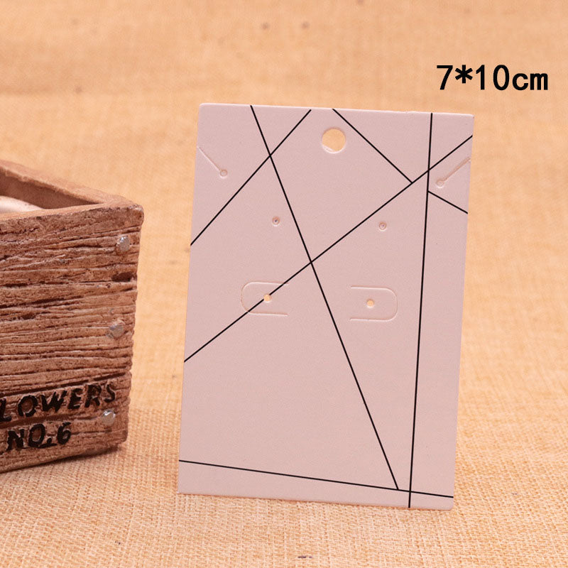 Tarjetas de exhibición de joyería blancas con líneas negras para collares y aretes - 70 x 100 mm - Fabricadas en China - NEW1024