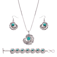 Conjunto de joyas con diseño de plumas y turquesa: aretes, collar y pulsera.
