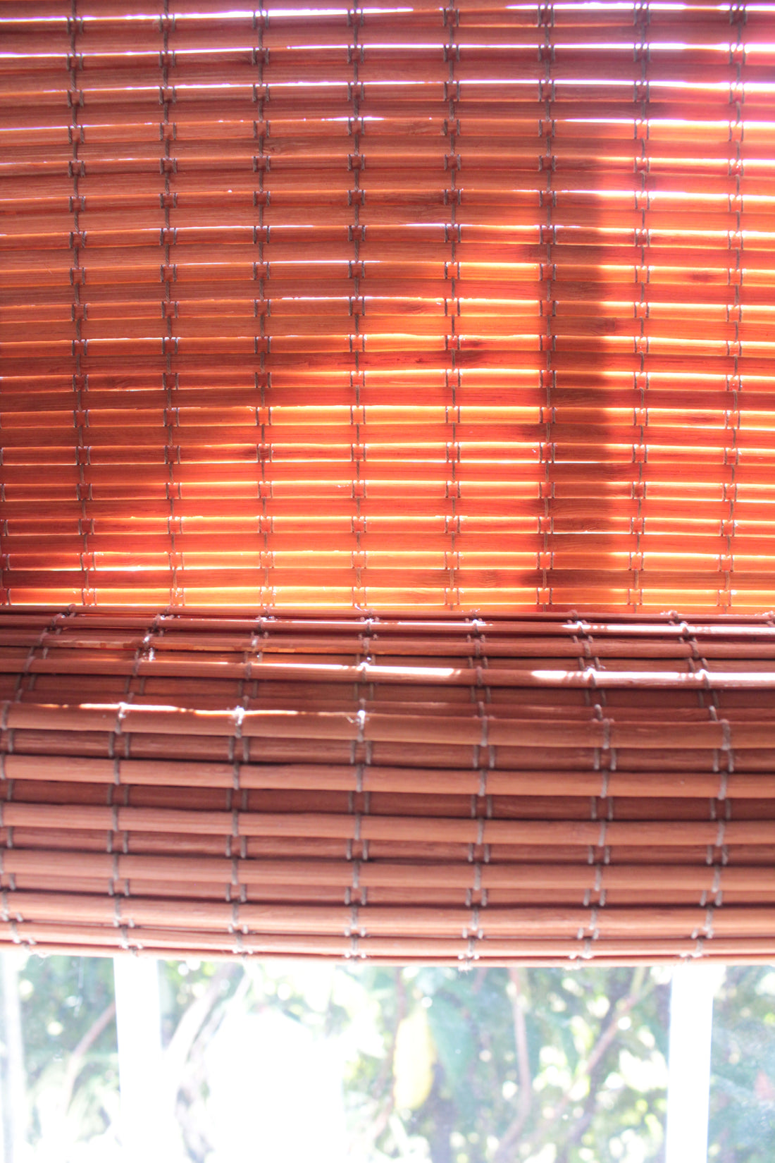 Sun filtering shade by minimizing gaps between slats; however, is not a privacy blind.